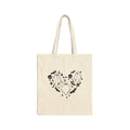 Ghosts with "I Love You" in ASL floating of hearts, skulls, bats